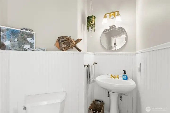 The downstairs half bath is handy to have down there and easily accessible from outside through the sliding glass doors or garage.