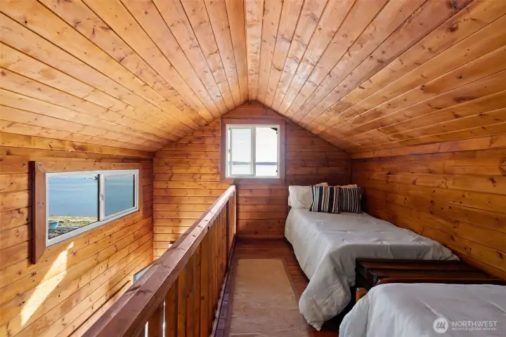 Upstairs in the loft area, there are two twin size beds for the ultimate glamping experience.