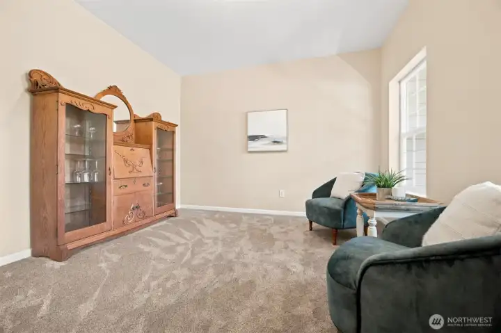Versatile main-level flex space ideal for a home office, library, or sitting room Versatile main-level flex space ideal for a home office, library, or sitting room