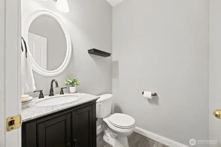 Convenient main-level powder room with updated finishes Convenient main-level powder room with updated finishes