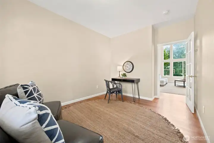 Main-level bedroom ideal for guests, a home office, or multi-generational living. Main-level bedroom ideal for guests, a home office, or multi-generational living.