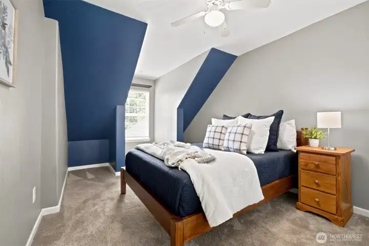 Comfortable upper-level bedroom with easy access to the landing and shared bath Comfortable upper-level bedroom with easy access to the landing and shared bath