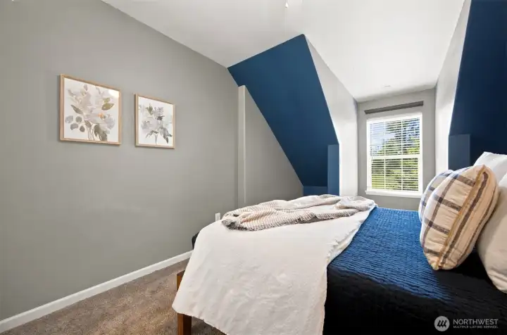 Comfortable upper-level bedroom with easy access to the landing and shared bath Comfortable upper-level bedroom with easy access to the landing and shared bath