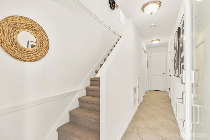 Enter on the main floor with direct entry to the 1 car garage (with freshly painted floor).