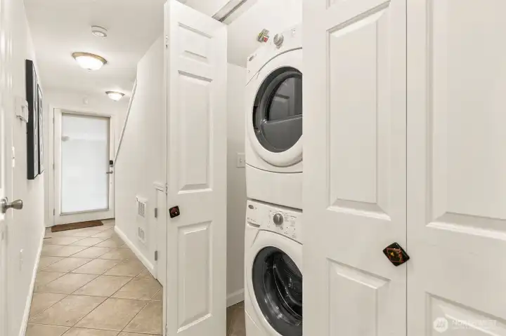 The laundry is conveniently located on the main level and shares the closet with the tankless water heater/boiler that supplies the home with radiant heat.