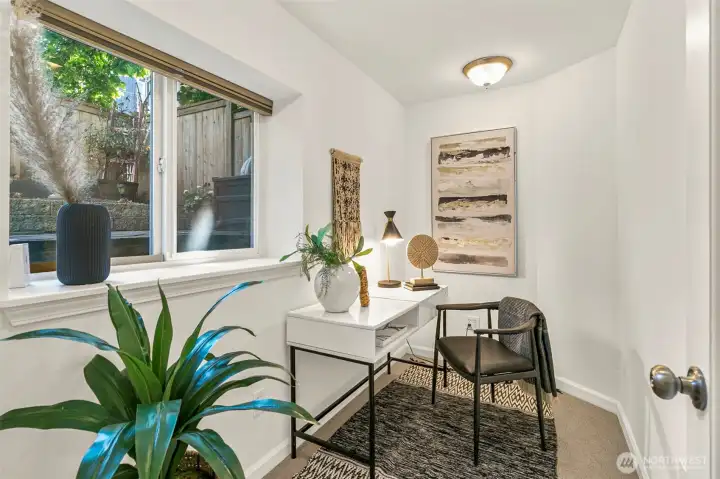 Office or flex space with a view to the back yard.
