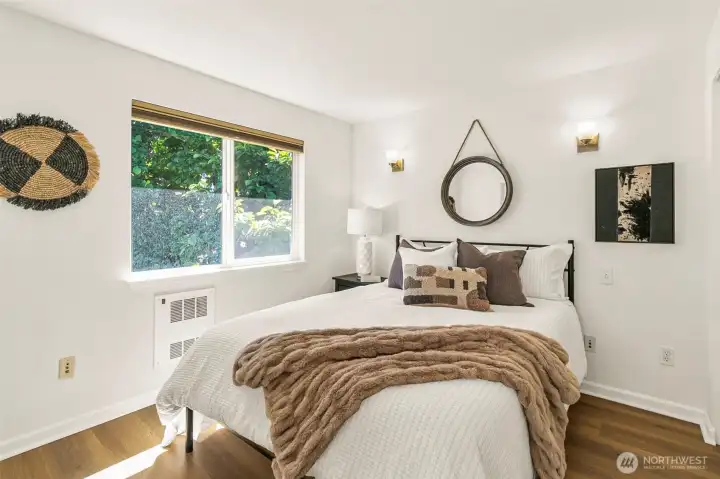 Upstairs guest bedroom suite with attached full bathroom.