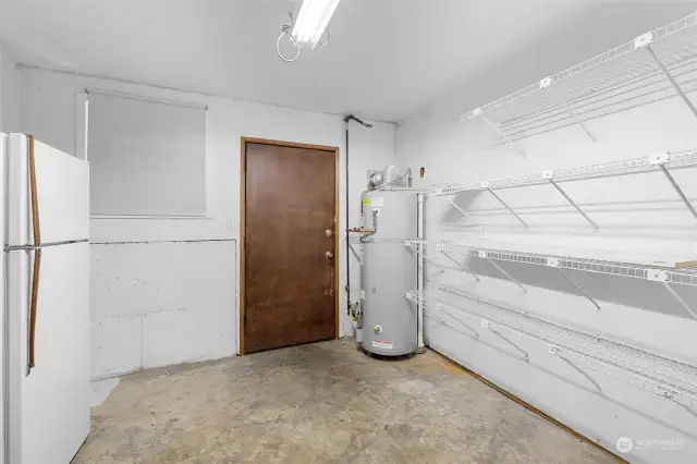 Utility Room, Gas Hot Water Heater  located on lower level Door access Patio and back yard