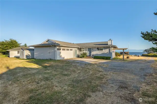 2-car attached garage and extra parking space.