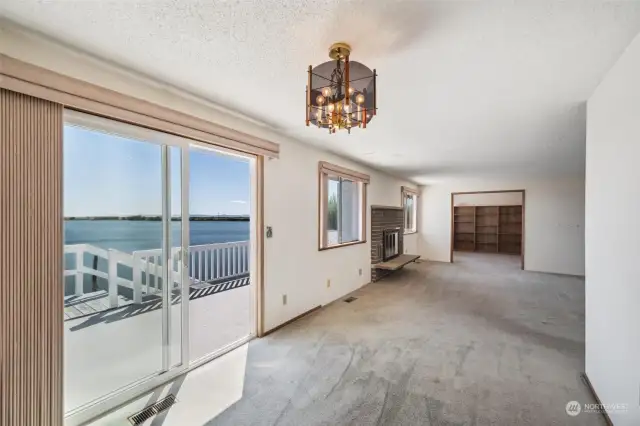 Sliding door opens to the large view deck off the Alice Bay side of the home.