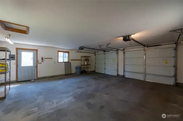 Side door in garage leads to the front door of the home.