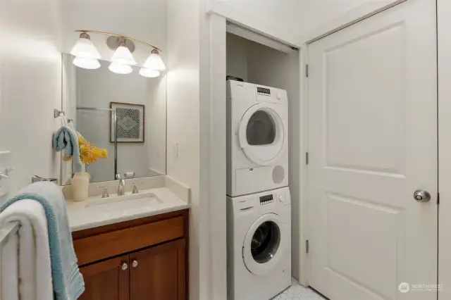 Second bathroom upstairs with laundry