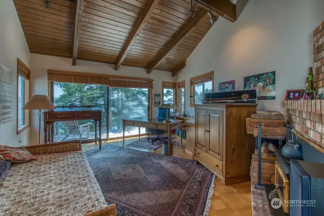 Upstairs study has extra space for guests.