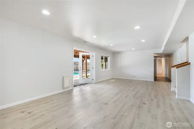 LL Family Room 2nd View - Hall on Right leads to Bedrooms and Bathroom