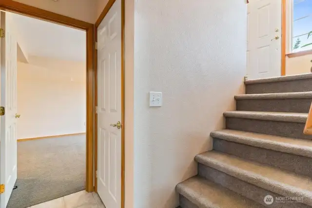 down stairs landing with storage