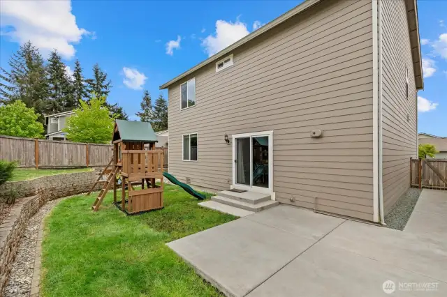 Plenty of space in the backyard.  Seller installed a concrete walkway along the entire north side of the home at the same time as the patio was installed in May 2024.