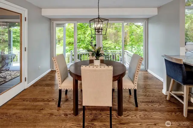 Inviting nook area with sliding doors to the massive deck