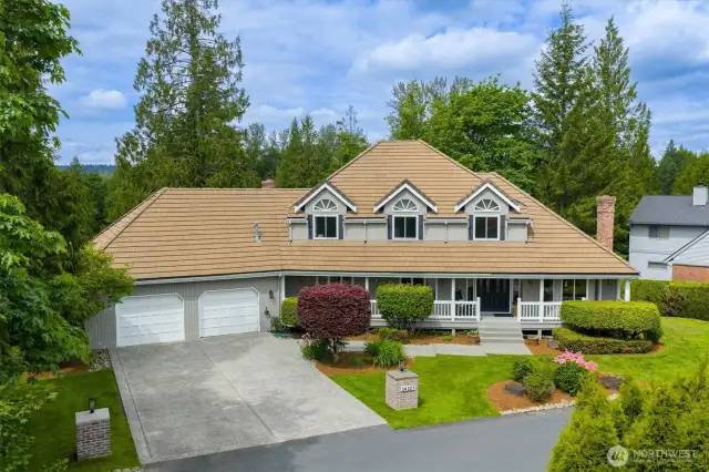 Don't let the 2 doors on the garage concern you. Extra deep very large garage. Flat driveway allows for ample guest parking when entertaining