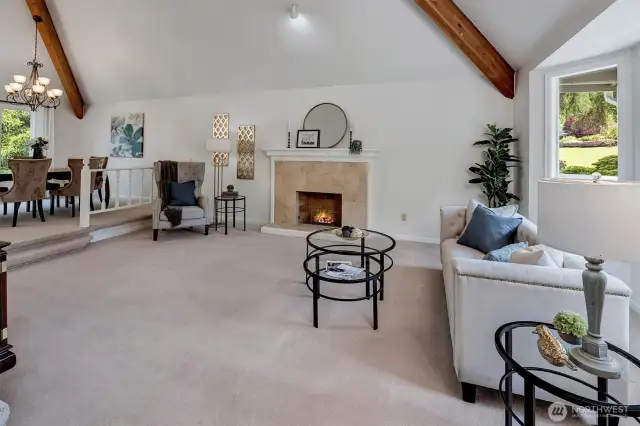 Entertainment sized living room with high vaulted ceilings. New carpet