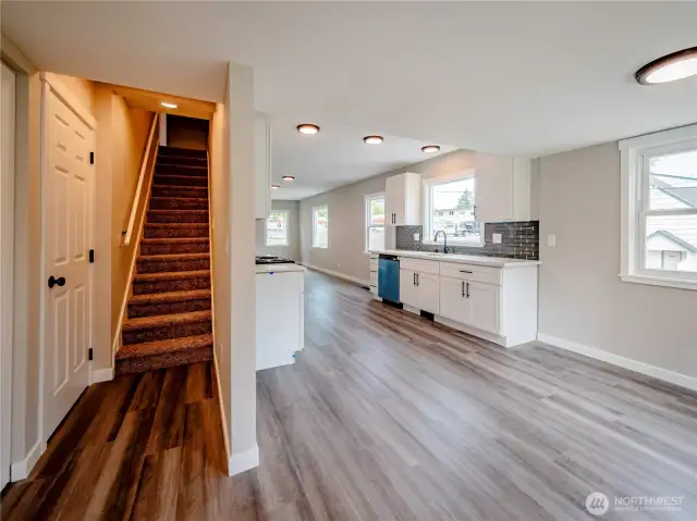 2 ADDITIONAL BEDROOMS UPSTAIRS...TO THE LEFT IS THE DOOR TO THE MONSTER GARAGE