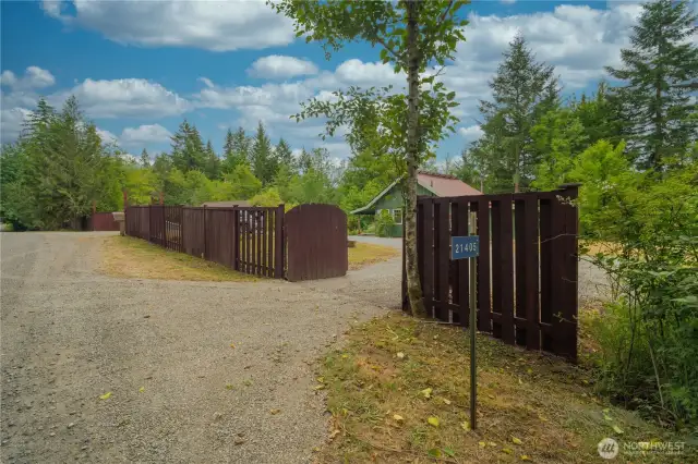 Front of the property with several access gates!