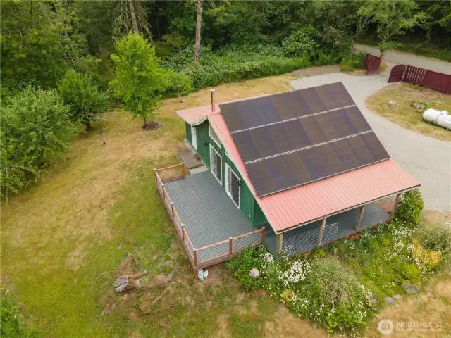 Solar panels on the roof, very low energy cost, covered front porch with large rear deck!