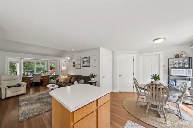 The open layout flows seamlessly into the kitchen, creating a bright and connected living space.