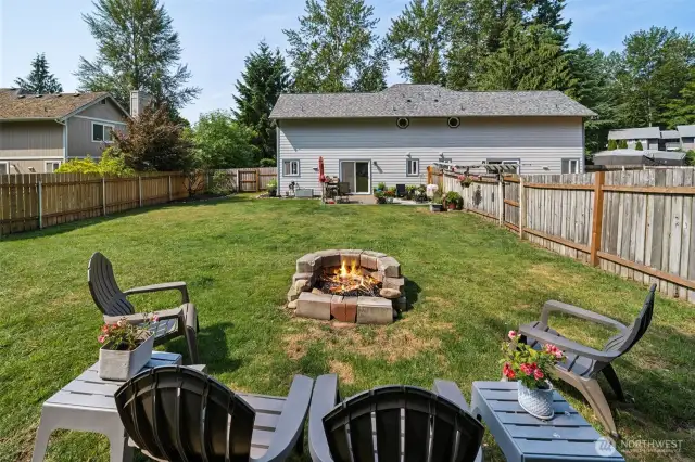 Enjoy privacy and room to roam with plenty of outdoor space for pets, gardening, or entertaining. A cozy firepit area sets the stage for memorable evenings under the stars.