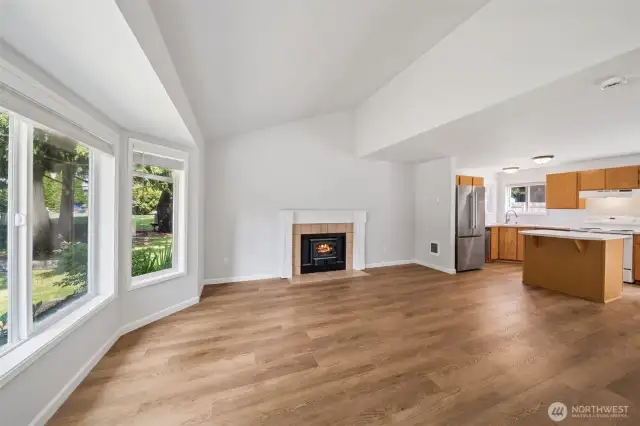 Fresh paint, new flooring, bright new vinyl windows....what's not to love about this?