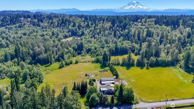 Pastures on both sides of buildings
