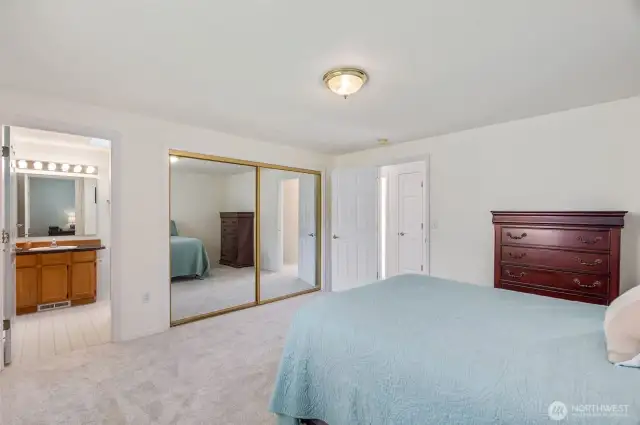 Primary bedroom with attached bathroom