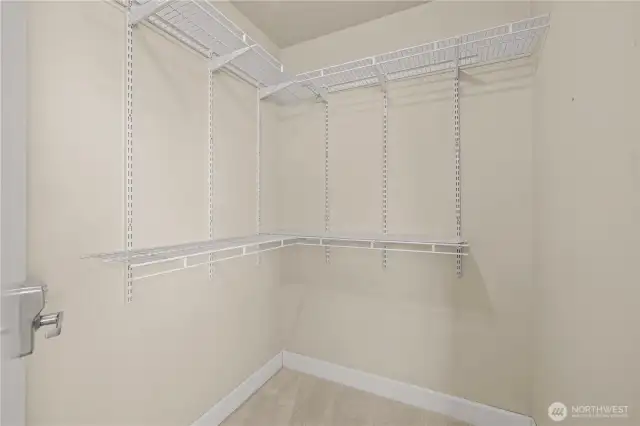 Primary Bedroom includes walk in closet, ensuite 5-piece bathroom w/soaking tub.