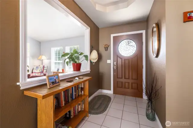 The open living area features a vaulted ceiling, bamboo flooring, and lots of natural light.