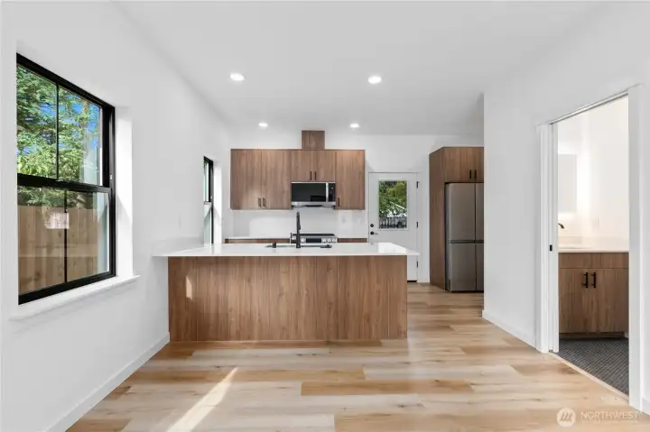 Walnut cabinets & island in kitchen