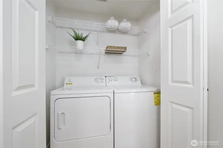 Side-by-side washer and dryer in the unit.  All appliances stay.
