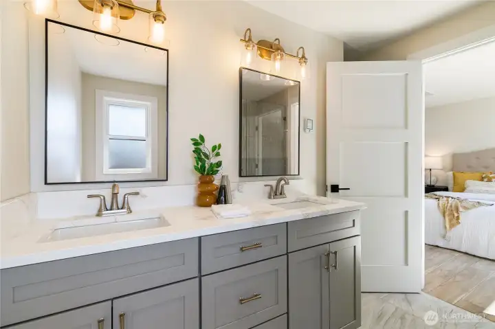 double vanity with heated floors in the primary bathroom