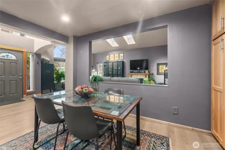 Perfectly placed cutout connects the two main areas of the main floor.