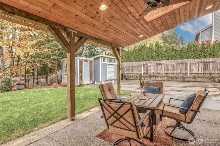 Covered patio with skylights invites backyard gatherings!