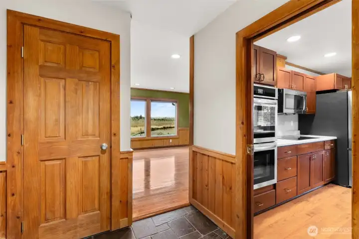 Entry features a handy closet and plenty of room for an entry table to create a warm first impression.