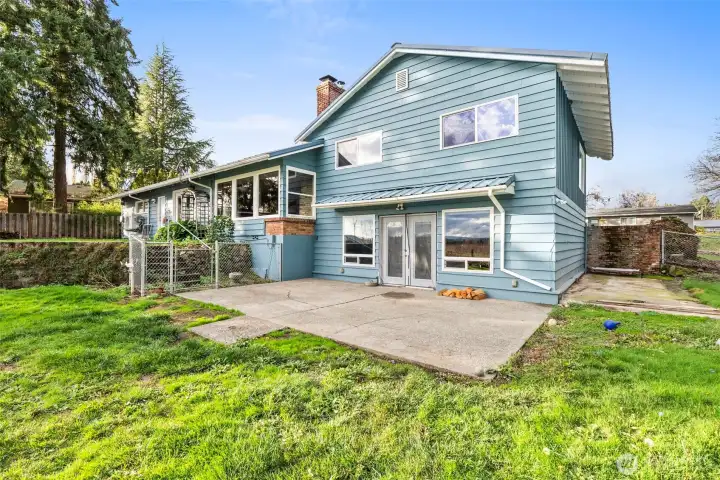 Patio outside the basement offers the perfect spot for summer dining and outdoor relaxation.