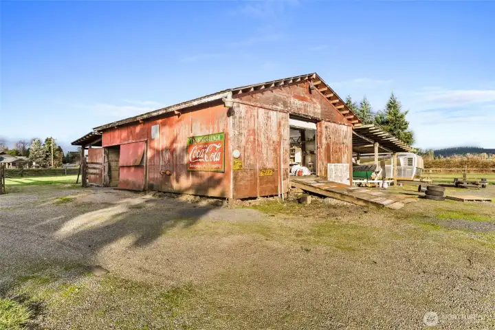 Versatile shop building with room for projects, equipment, or livestock needs. A great fit for hobbyists, sustainable living enthusiasts, or anyone needing additional storage.