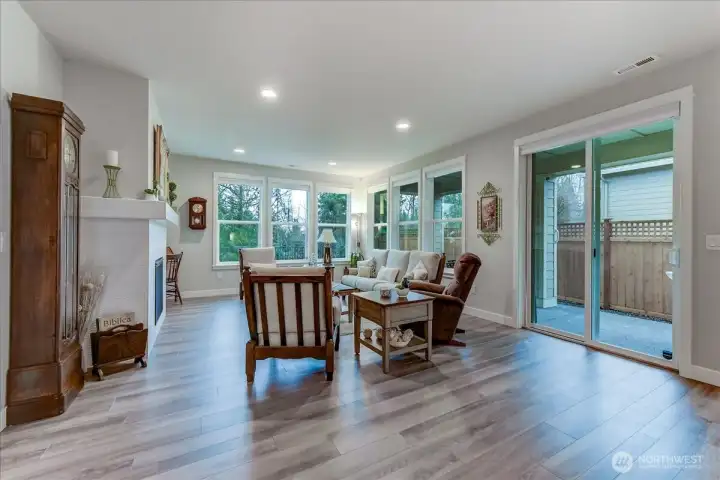 Living Room with Gas Fireplace & Tall windows for tons of natural light.