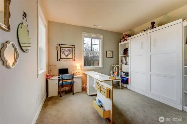 Guest Bedroom with Murphy Bed & shelving.