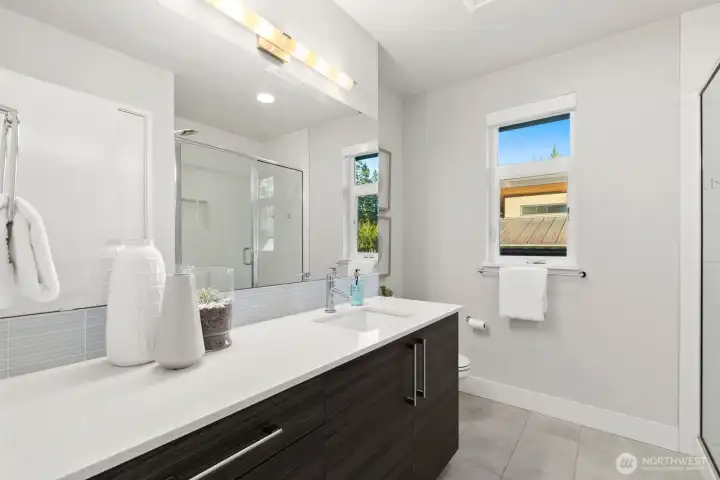 Guest bathroom w glass shower to the right