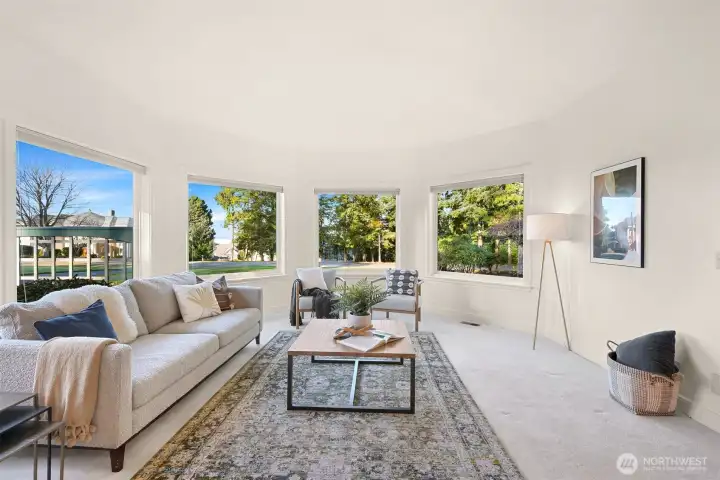 Walls of windows fill with light, views, and outdoor connection.