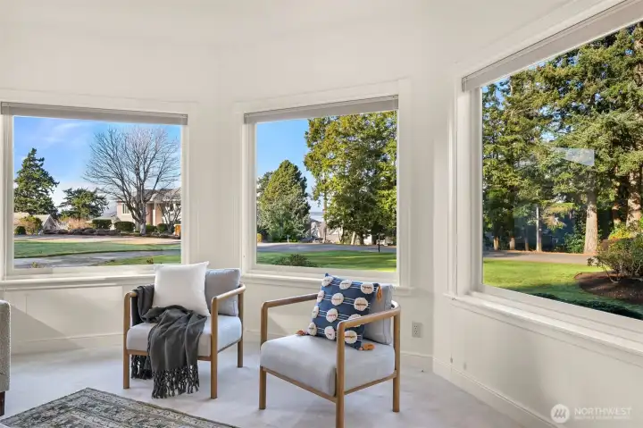 Framed Bay views enhance living and dining room elegance.