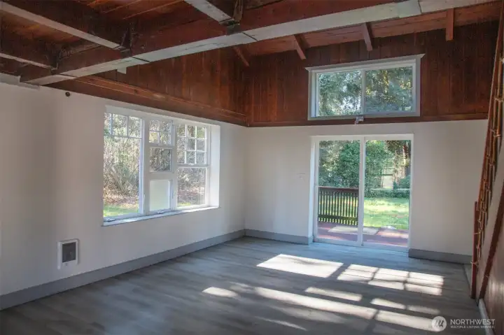 Open Living Room with high ceilings and lots of light