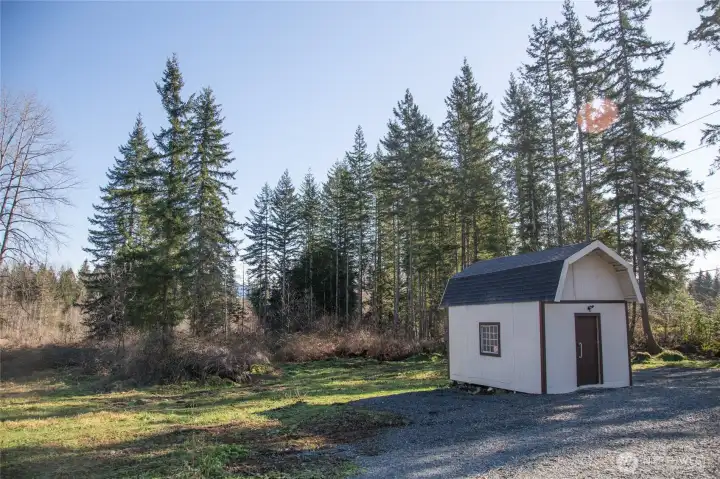 Shed with loft and 220 power with Rock Driveway