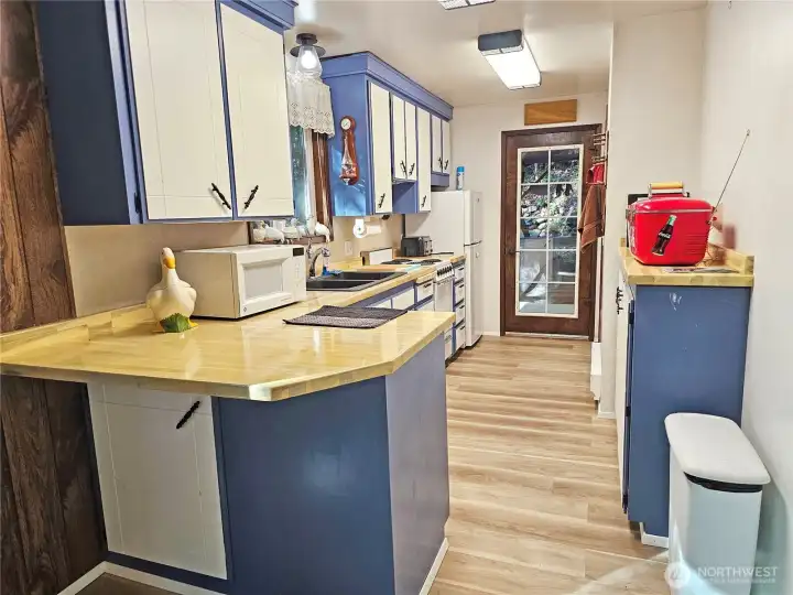 Looking back into the kitchen from the dining room.