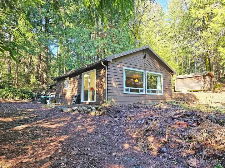 Ample parking, including a covered space behind the house.